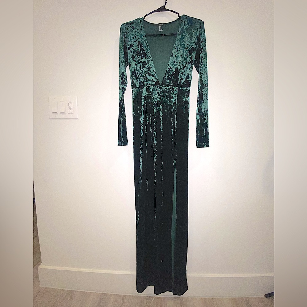 Emerald green deep cut maxi length dress
